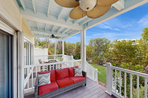 Charming townhome with ocean views, an open porch & steps from the water