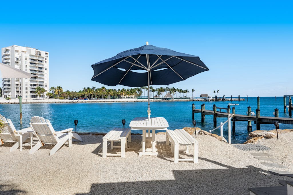 Waterfront beauty with a dock, small private beach, washer/dryer, & gas grill