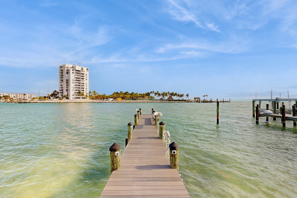 Waterfront beauty with a dock, small private beach, washer/dryer, & gas grill