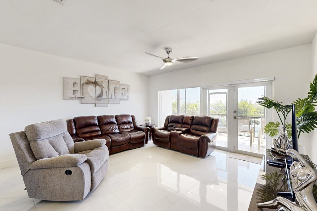 Serene retreat with private dock, pool, washer/dryer, & canal access