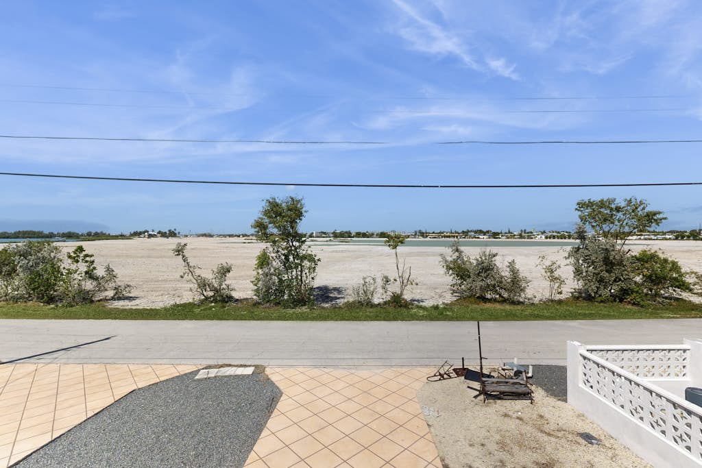 Serene retreat with private dock, pool, washer/dryer, & canal access