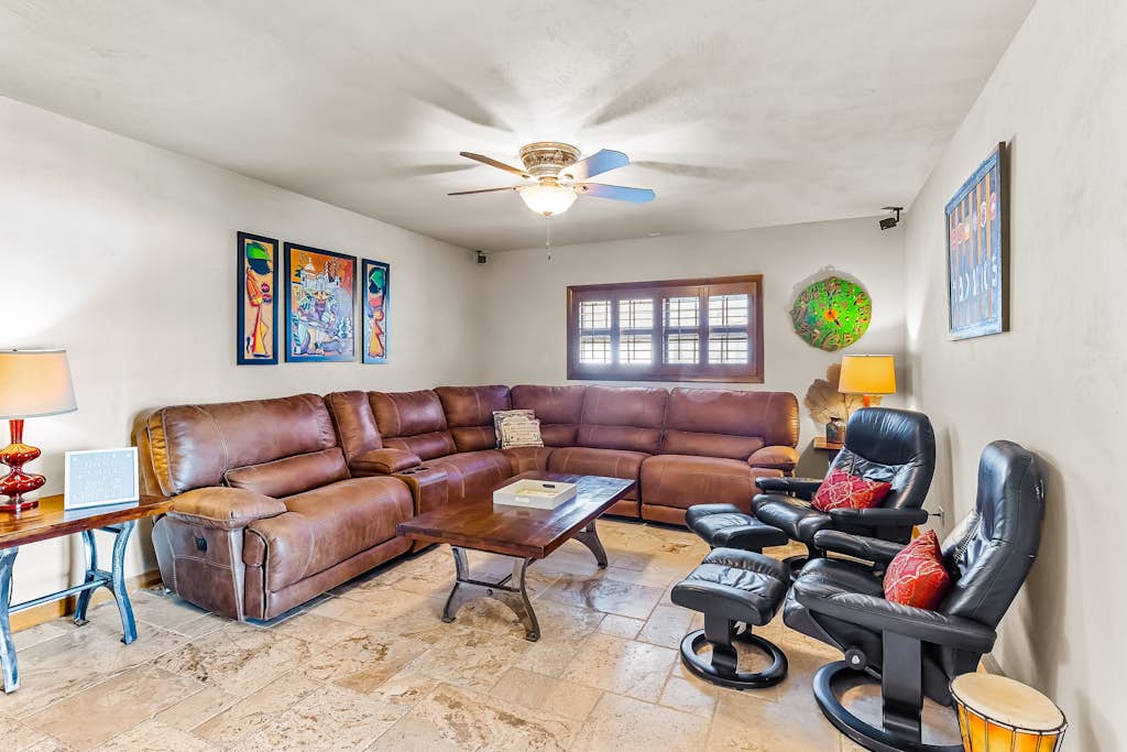 Custom canal-front home with private pool, palapa hut, & outdoor kitchen