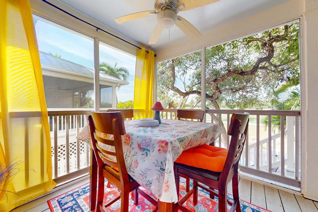 Colorful home in private community with resort pool & hot tub, on-site golf