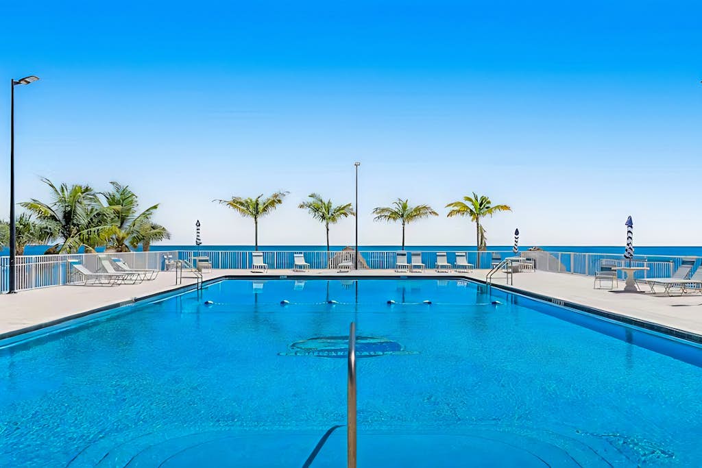 Gulfside condo with gorgeous ocean views, pool, WiFi, & close to attractions