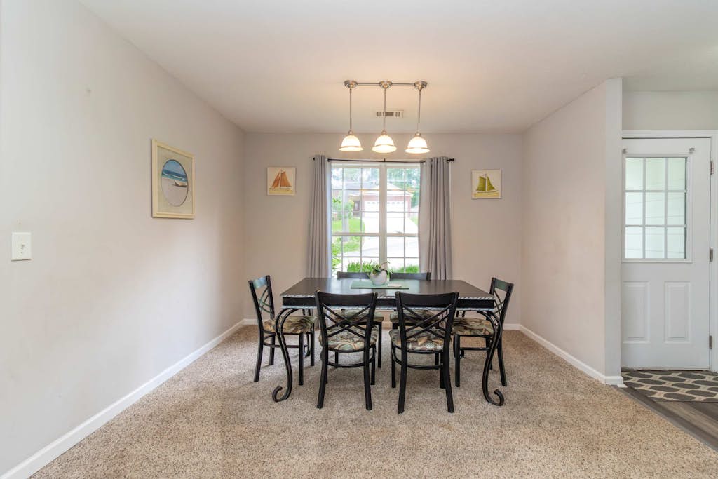 This charming home sits on a beautiful hill centrally located in Midtown Columbus minutes from shopping, restaurants, the interstate, Downtown and Fort Moore. Beautifully renovated open-concept kitchen, living room, dining room with large dining room table and breakfast nook. 3 bedrooms and 2 baths including a master suite with shower and jacuzzi. Great deck with furniture and lots of sun. Sleeps 10! Pets welcome! Wifi, Roku, and board games included. Perfect for families and work travelers!