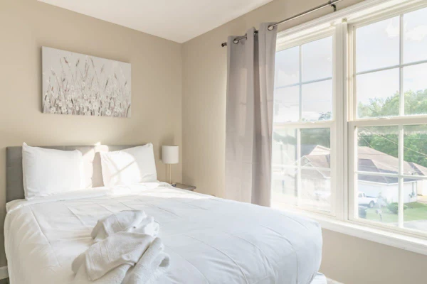 Welcome to this gorgeous two-story home on a corner lot in a quiet Columbus neighborhood. With 4 spacious bedrooms and 2.5 baths, it comfortably sleeps up to 12 guests. Enjoy a stay designed for making memories with family and friends—we’ve provided everything you need to feel at home. Pets are welcome with a fee. We’d love to host you!