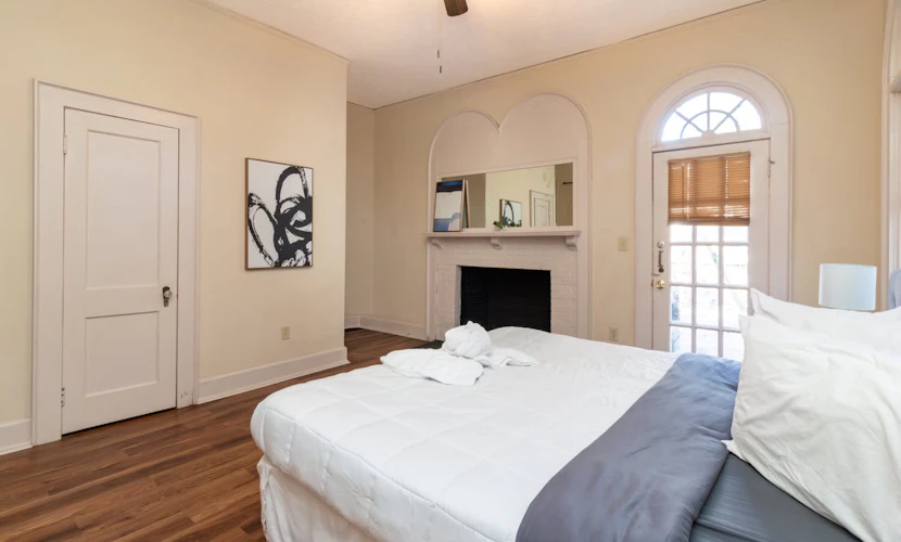 Welcome to Midtown Magic! This two-unit home sleeps up to 23 guests with 6 bedrooms and 4 bathrooms total. The main house has 5 bedrooms and 3 bathrooms, and the back unit has 1 bedrooms and 1 bathroom. Conveniently located just minutes from Lake Bottom Park, the Botanical Gardens, Coca-Cola Space Science Center, downtown, and Fort Benning/Moore. Photos include professional and real-time images so you know what to expect.