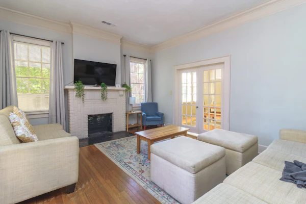 Welcome to Midtown Magic! This two-unit home sleeps up to 23 guests with 6 bedrooms and 4 bathrooms total. The main house has 5 bedrooms and 3 bathrooms, and the back unit has 1 bedrooms and 1 bathroom. Conveniently located just minutes from Lake Bottom Park, the Botanical Gardens, Coca-Cola Space Science Center, downtown, and Fort Benning/Moore. Photos include professional and real-time images so you know what to expect.