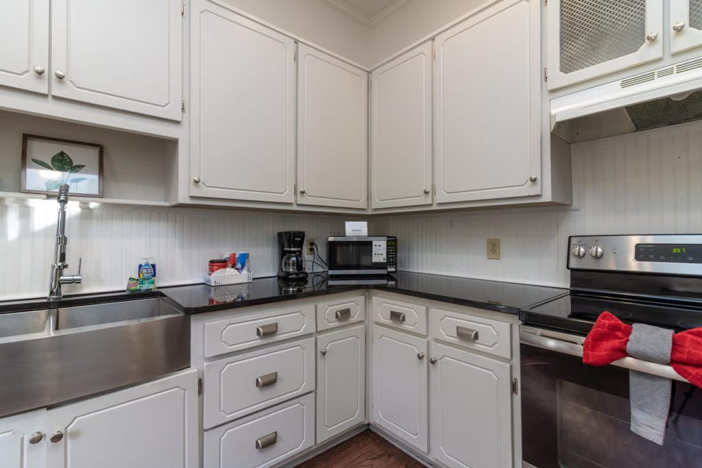 Welcome to Midtown Magic! This two-unit home sleeps up to 23 guests with 6 bedrooms and 4 bathrooms total. The main house has 5 bedrooms and 3 bathrooms, and the back unit has 1 bedrooms and 1 bathroom. Conveniently located just minutes from Lake Bottom Park, the Botanical Gardens, Coca-Cola Space Science Center, downtown, and Fort Benning/Moore. Photos include professional and real-time images so you know what to expect.