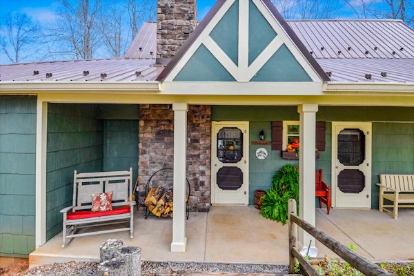 Waterfront lake-view home with dock, fireplace, pool table, kayaks, & firepit