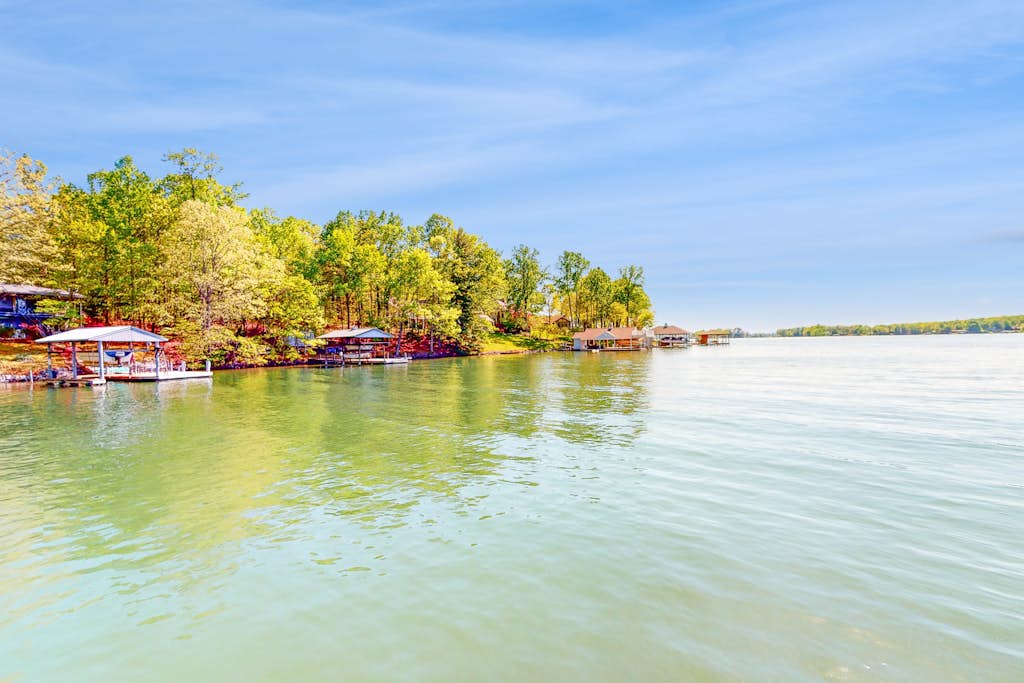 Jewelbox Cottage - Dog-friendly Lakefront home with private dock, canoe & SUPs