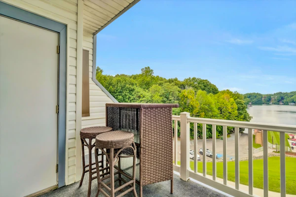 Waterfront condo with lake-view deck, tennis court & pool - dog-friendly