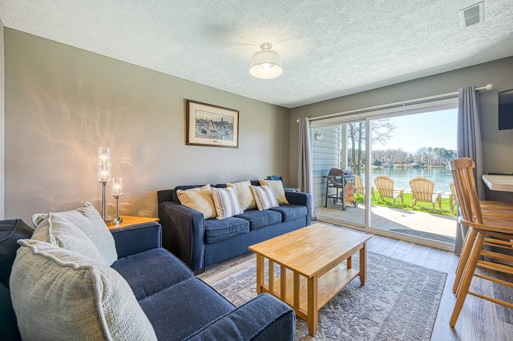 Sunset Cove - Waterways lakefront retreat with boat slip, pool & beach - dogs OK