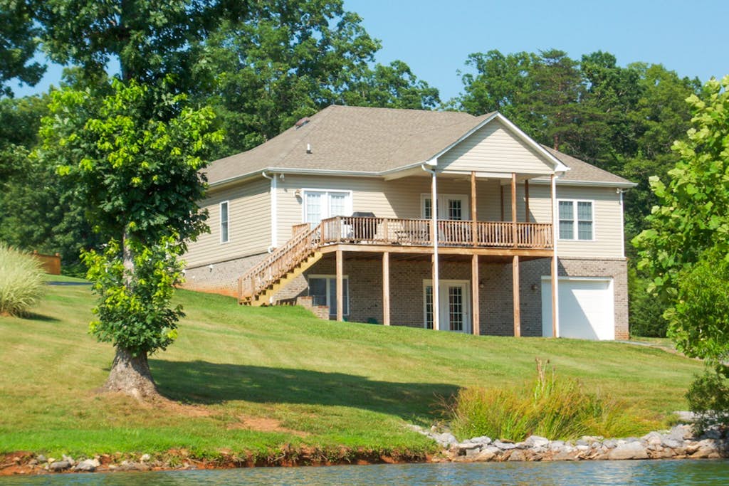 Great home with powered dock, boat launch, outdoor pool, & beach