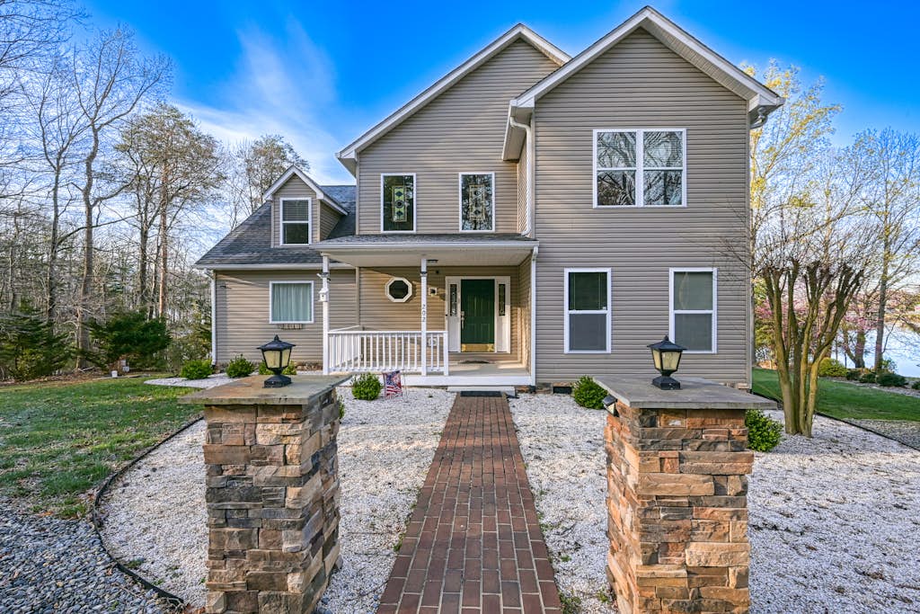 Doc Side - Serene lakefront home with dock, hot tub, pool table & beautiful views