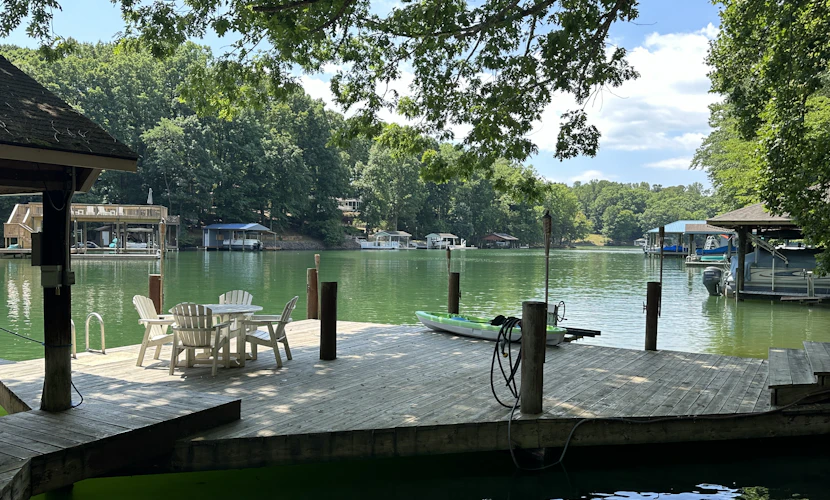 Inviting lakefront home with firepit, balcony & W/D - dog-friendly