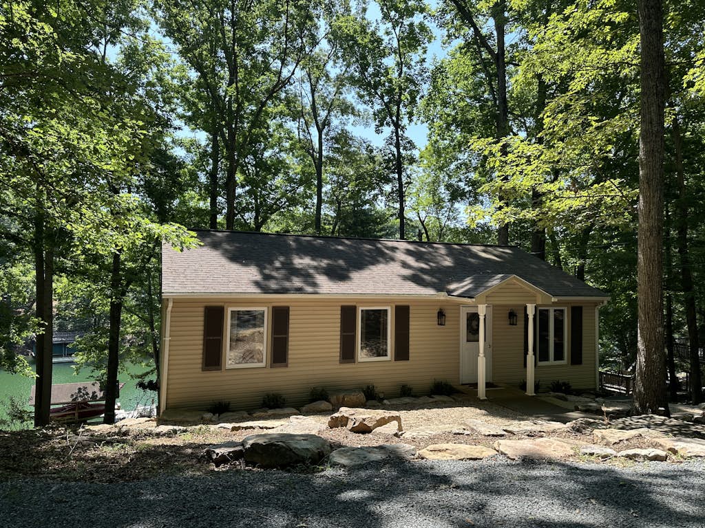 Inviting lakefront home with firepit, balcony & W/D - dog-friendly