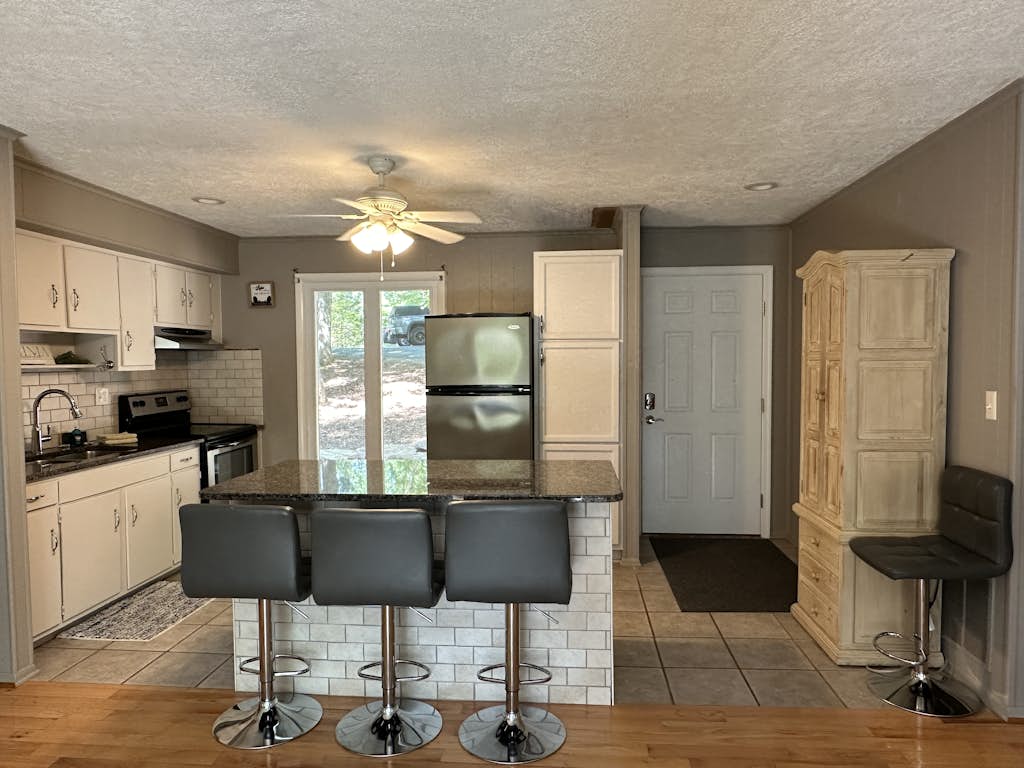 Inviting lakefront home with firepit, balcony & W/D - dog-friendly