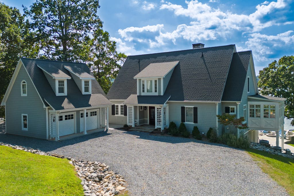 Lakefront home with amazing views, dock, firepit, foosball, patio, garage studio