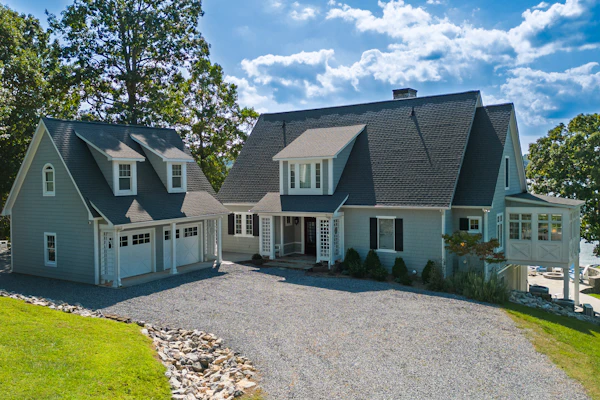 Lakefront home with amazing views, dock, firepit, foosball, patio, garage studio