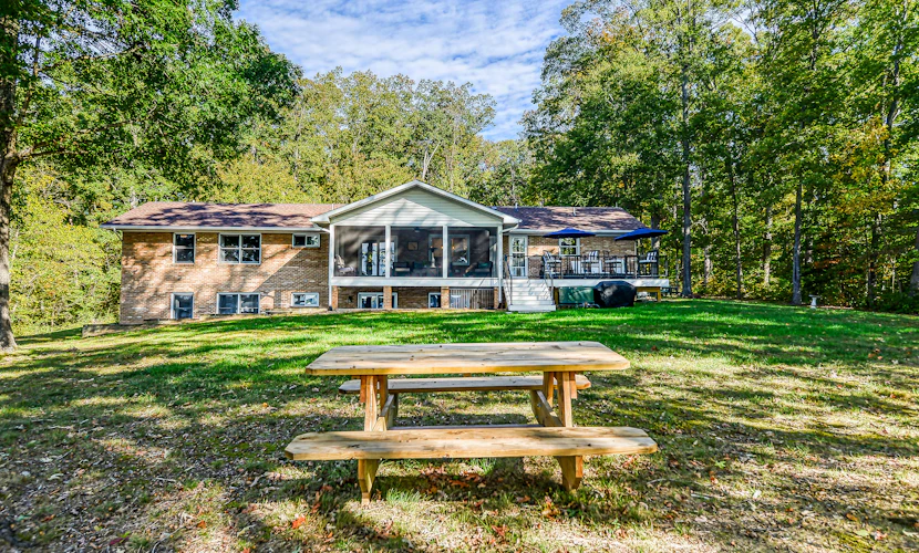 Lakefront Home with Private Dock, Hot Tub, Fireplace, & Central A/C - Free WiFi