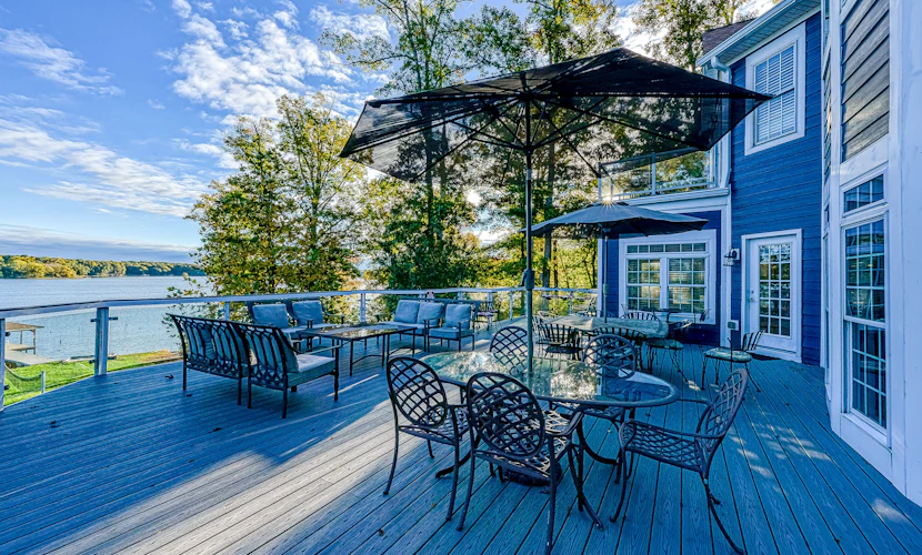 Lakefront home with private hot tub, WiFi, fun rec room, & beach area