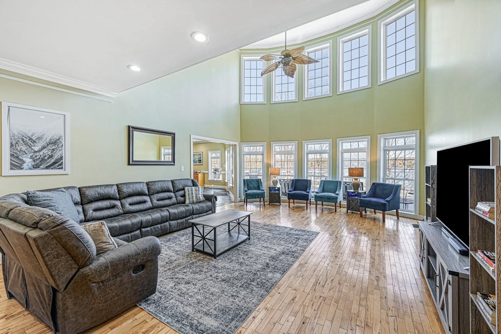 Lakefront home with private hot tub, WiFi, fun rec room, & beach area