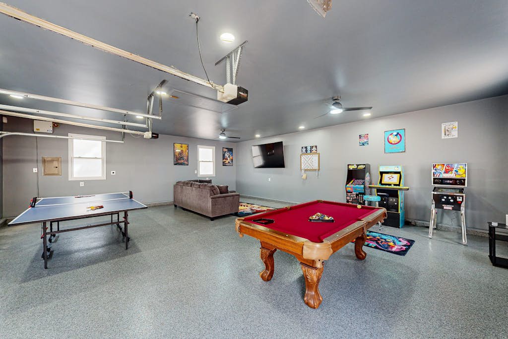 Lakefront home with two kitchens, a dock, firepit, & pontoon