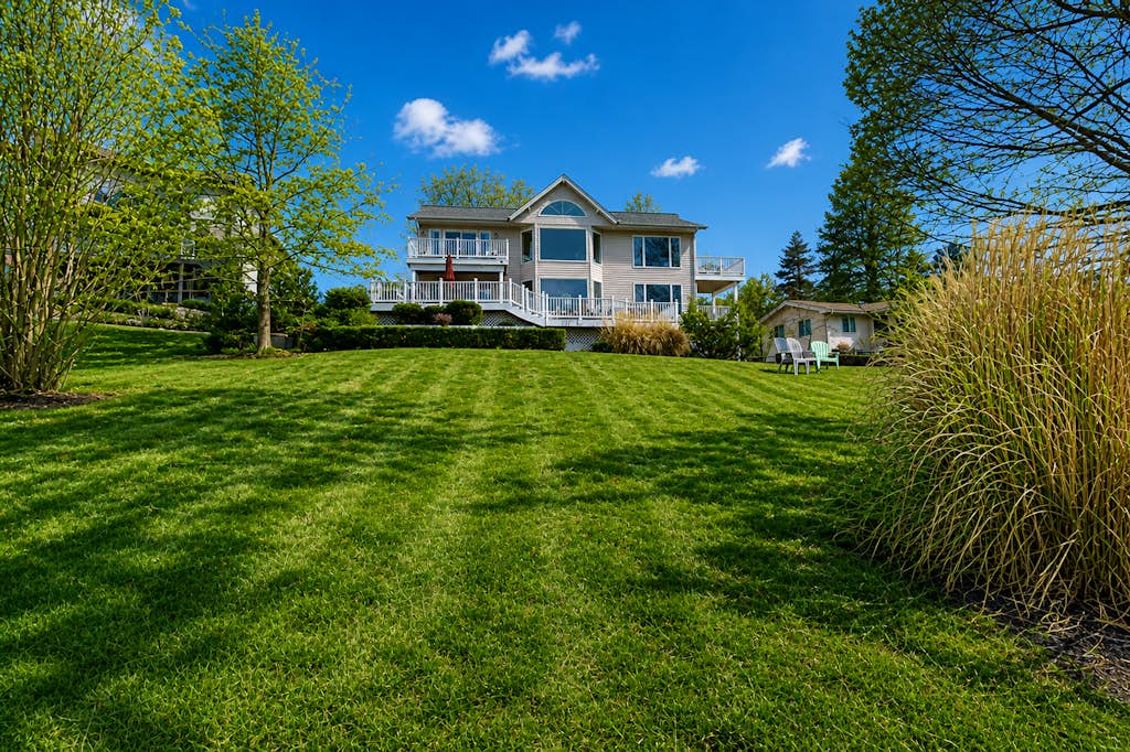 Lakefront retreat with views, hot tub, kid's play area, dock & fiber internet