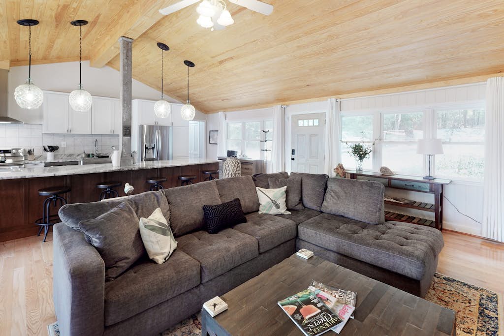 Lakefront home with granite counters, fireplace, lake views, & dock