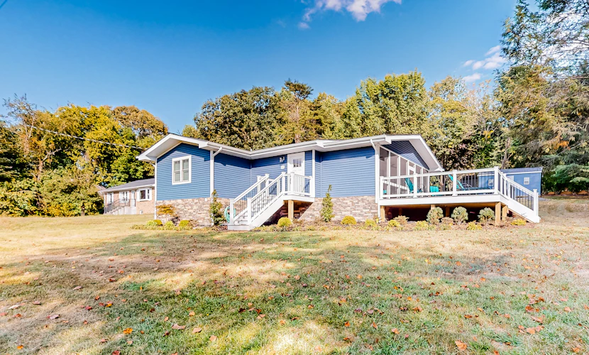 Lakefront, renovated, dog-friendly home with dock, paddleboards & firepit