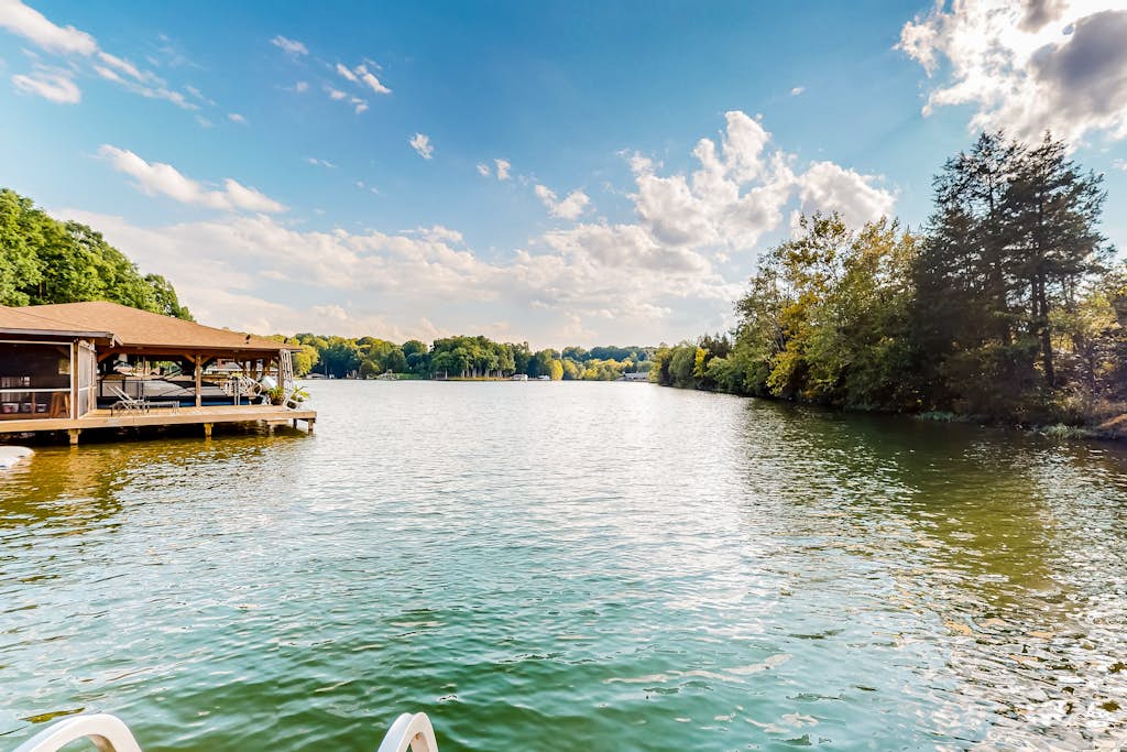 Lakefront, renovated, dog-friendly home with dock, paddleboards & firepit