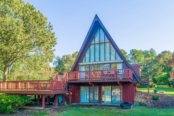 Charming, lakefront A-frame with private dock, lakeside gazebo, spacious deck