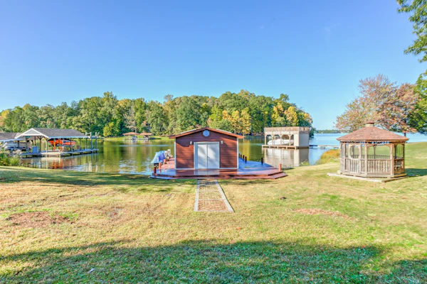 Charming, lakefront A-frame with private dock, lakeside gazebo, spacious deck