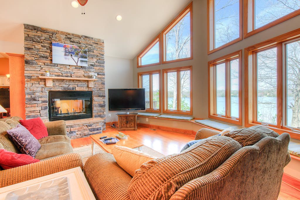 Dog-friendly, lakefront vacation home w/ a boat house, kayaks, & paddleboards