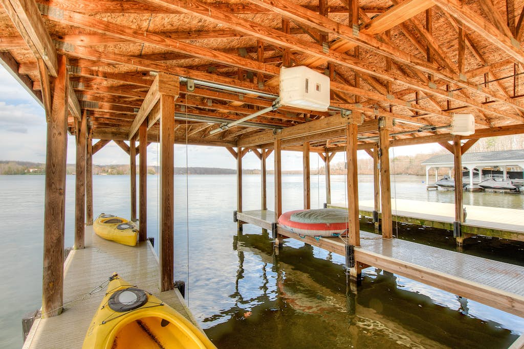 Dog-friendly, lakefront vacation home w/ a boat house, kayaks, & paddleboards
