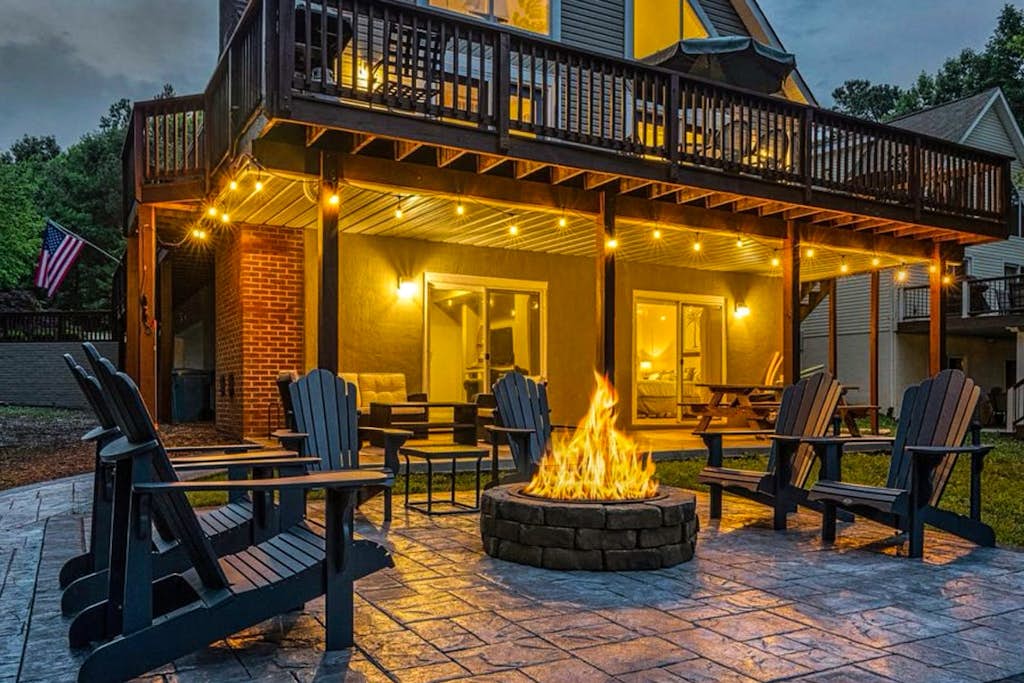 Lakefront home with brand-new hot tub, dock, kayaks, SUP, game room & firepit