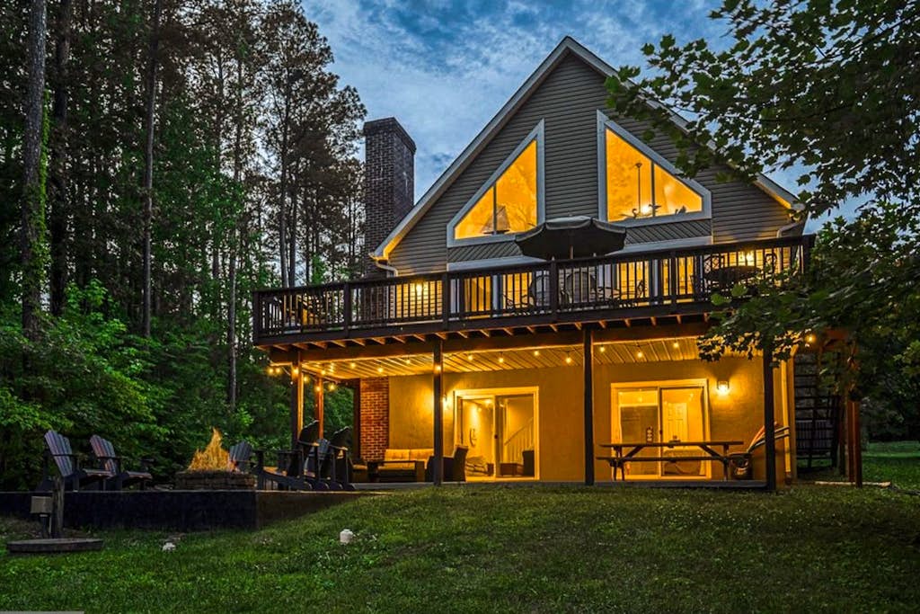 Lakefront home with brand-new hot tub, dock, kayaks, SUP, game room & firepit