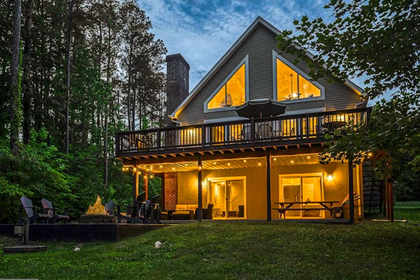 Lakefront home with brand-new hot tub, dock, kayaks, SUP, game room & firepit