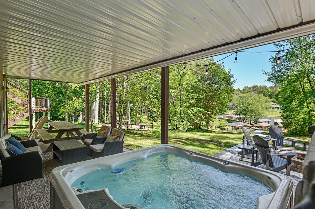 Lakefront home with brand-new hot tub, dock, kayaks, SUP, game room & firepit