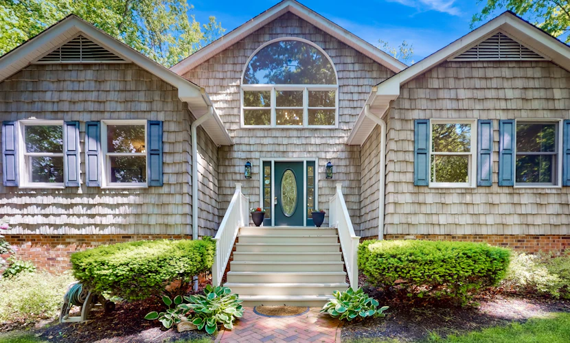 Stunning lakefront retreat w/firepit, game room, & water views