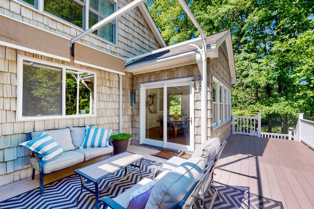 Stunning lakefront retreat w/firepit, game room, & water views