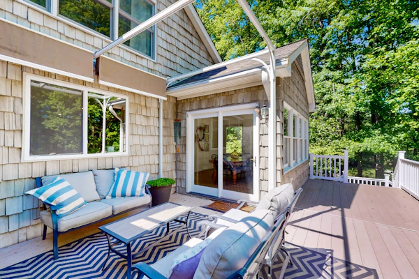 Stunning lakefront retreat w/firepit, game room, & water views