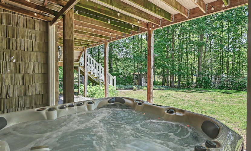 Stunning lakefront retreat w/firepit, game room, & water views