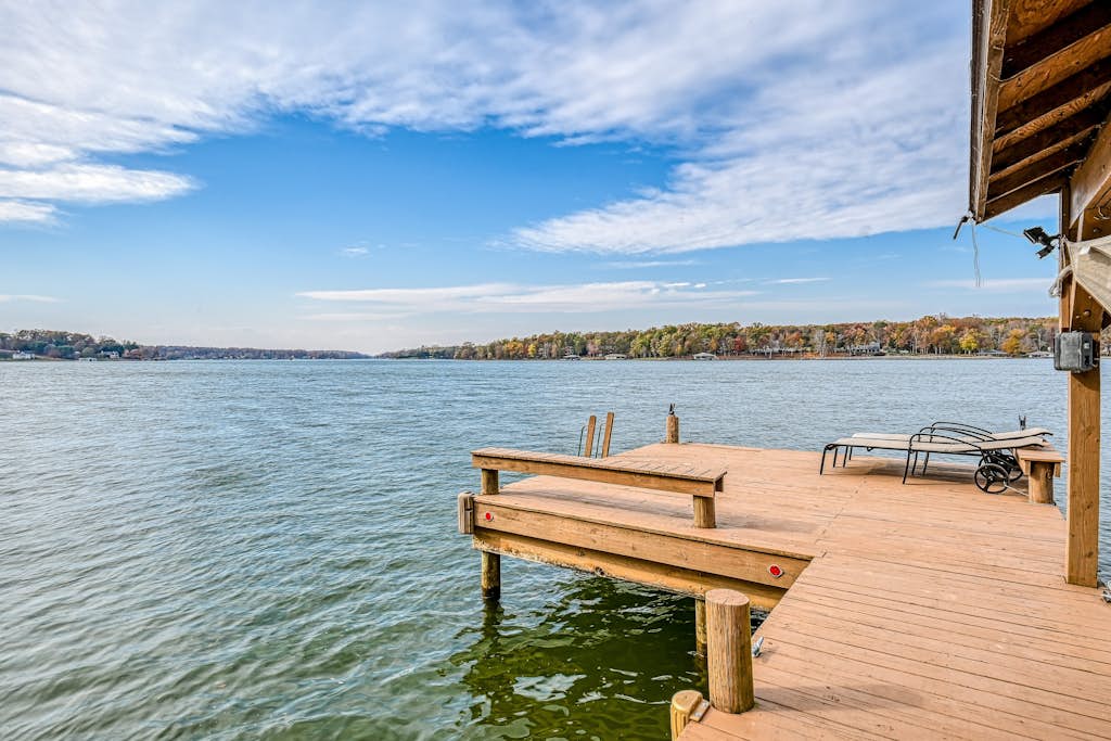 Enchanting lakefront oasis with fire pit, generous patio, dock, & amazing views