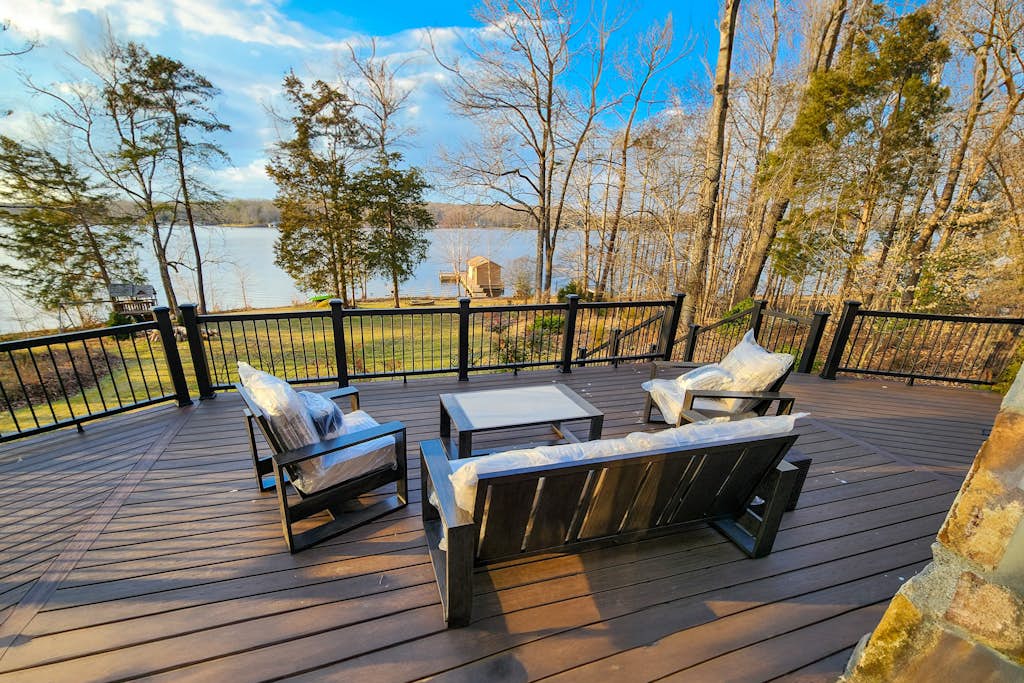 Enchanting lakefront oasis with fire pit, generous patio, dock, & amazing views