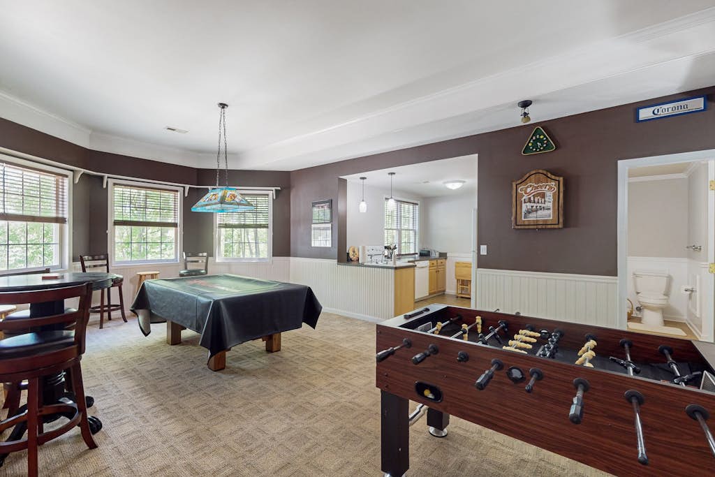 Lakefront with pool, hot tub, dock, SUPs, water carpet, billiards, foosball, gym