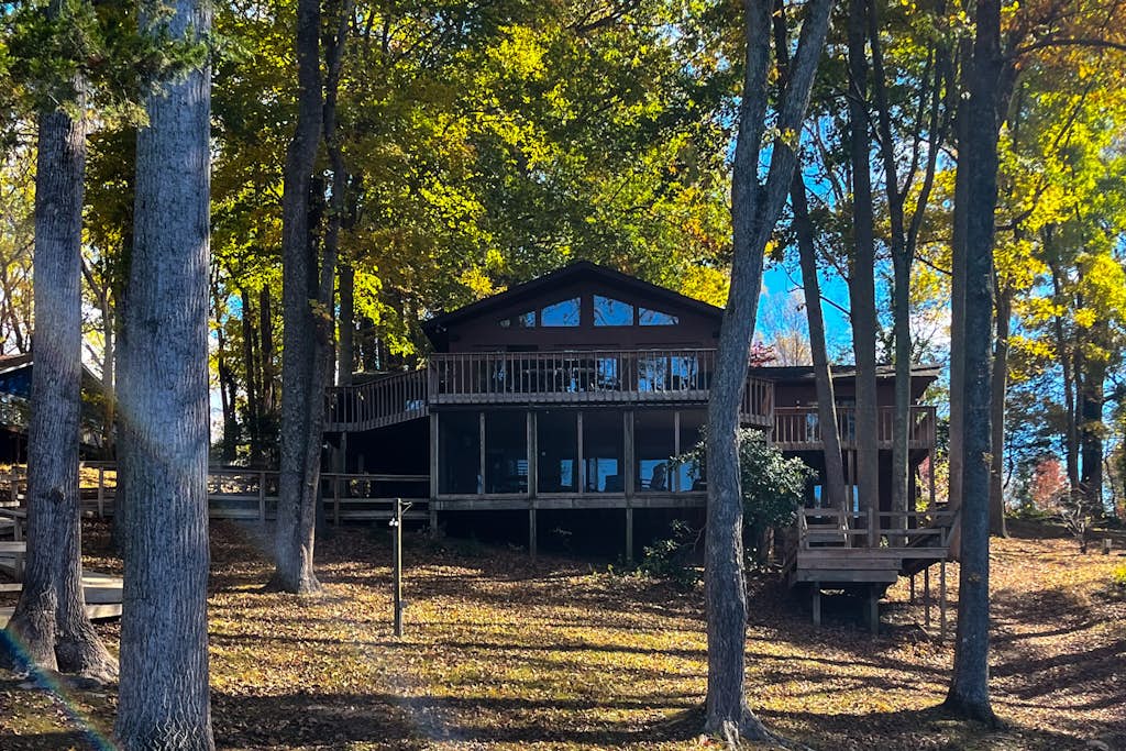 Lovely lakefront home with private brand-new dock, game room, beach, boat access