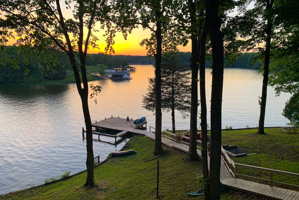 Lovely lakefront home with private brand-new dock, game room, beach, boat access