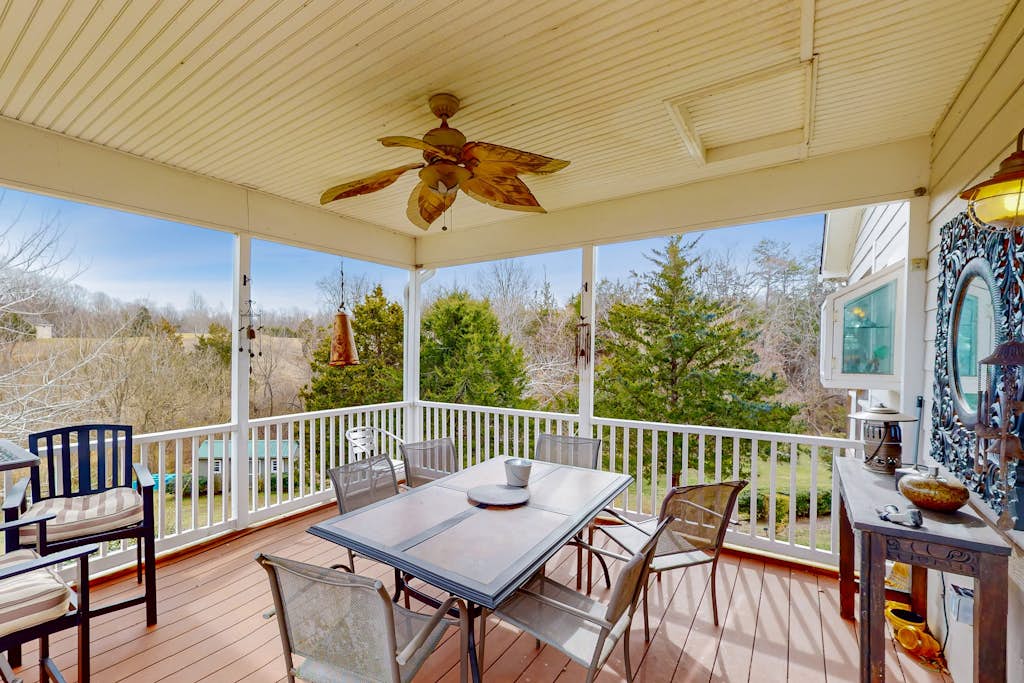 Nature lover’s lakefront home with a beach, dock, fire ring, & more